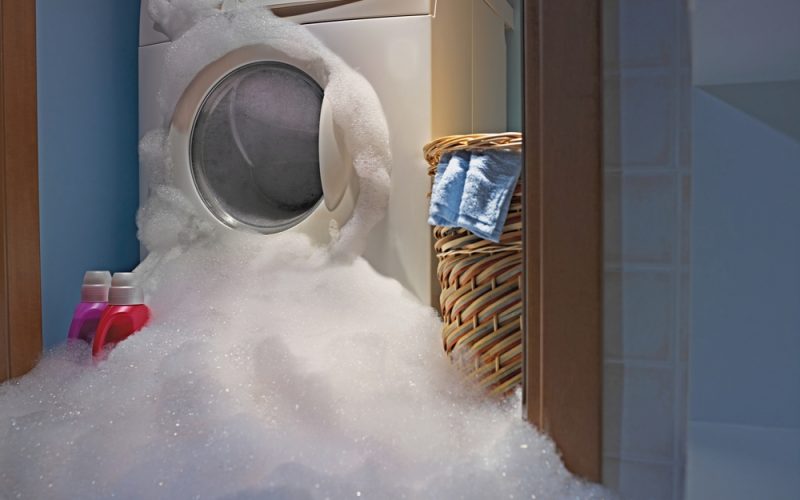 Soap coming out from a broken washing machine