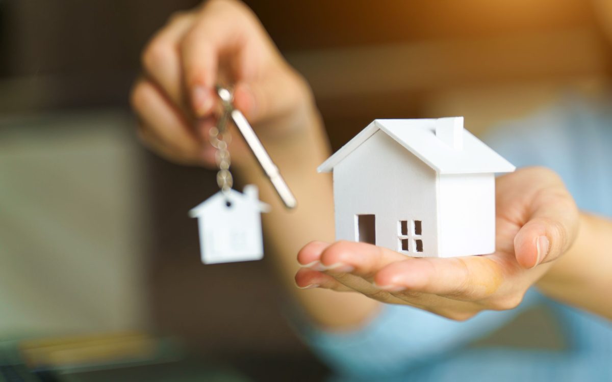white home and keys
